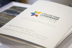 Collective Leadership Publications: A stack of CLI flyers